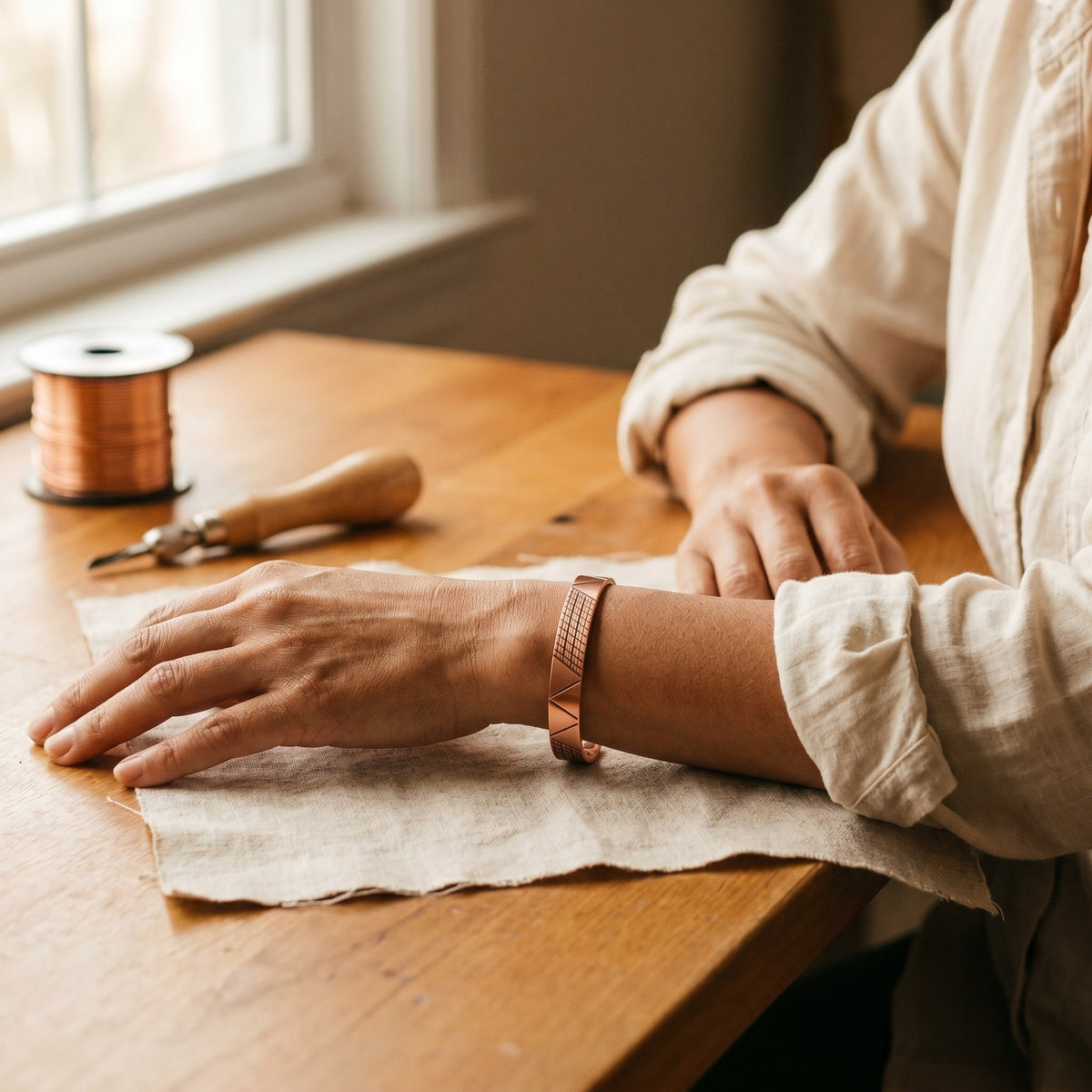 Nora's Crest Copper Bracelet